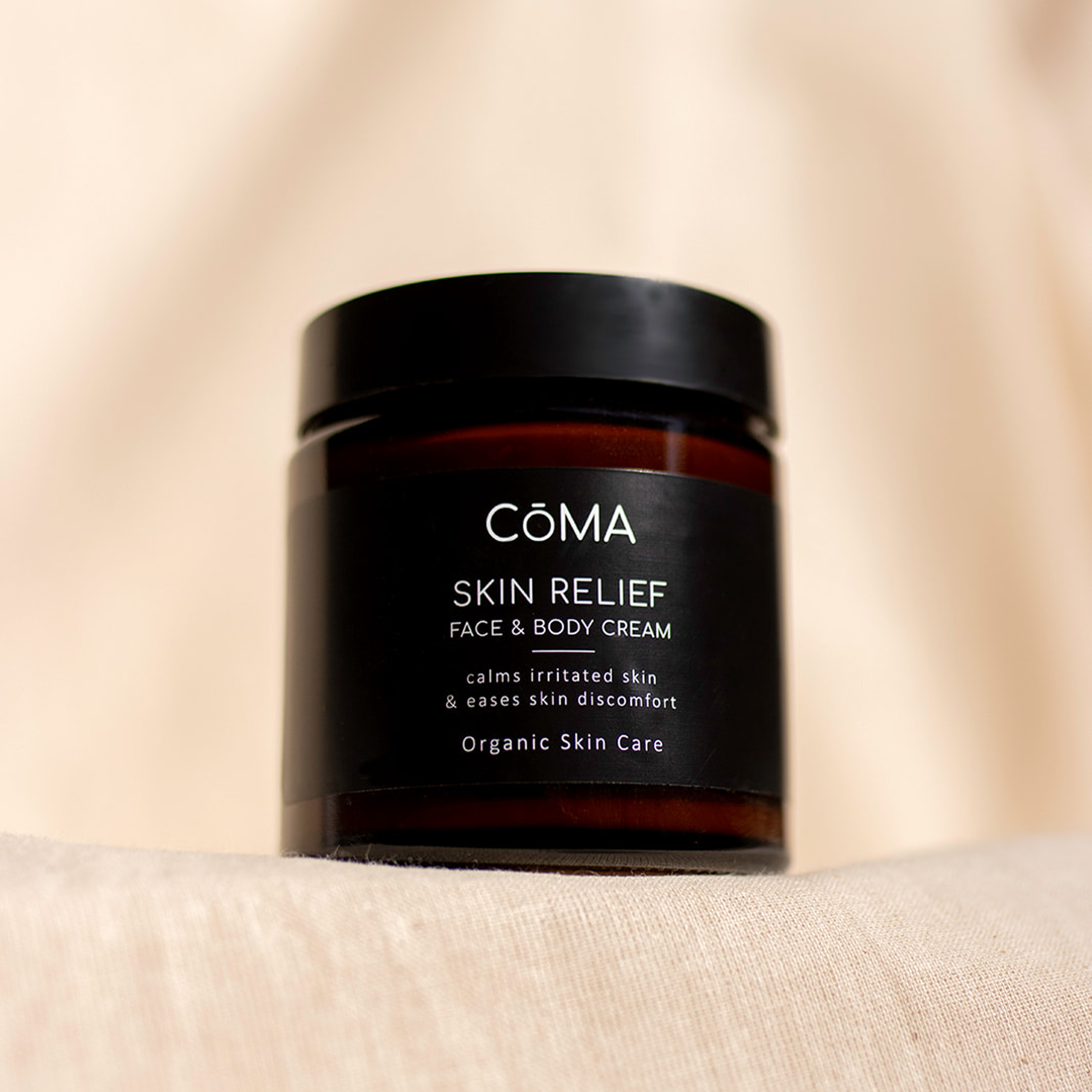 Skin Relief Lotion in a jar, designed to calm irritated skin and ease discomfort, part of organic skin care line.